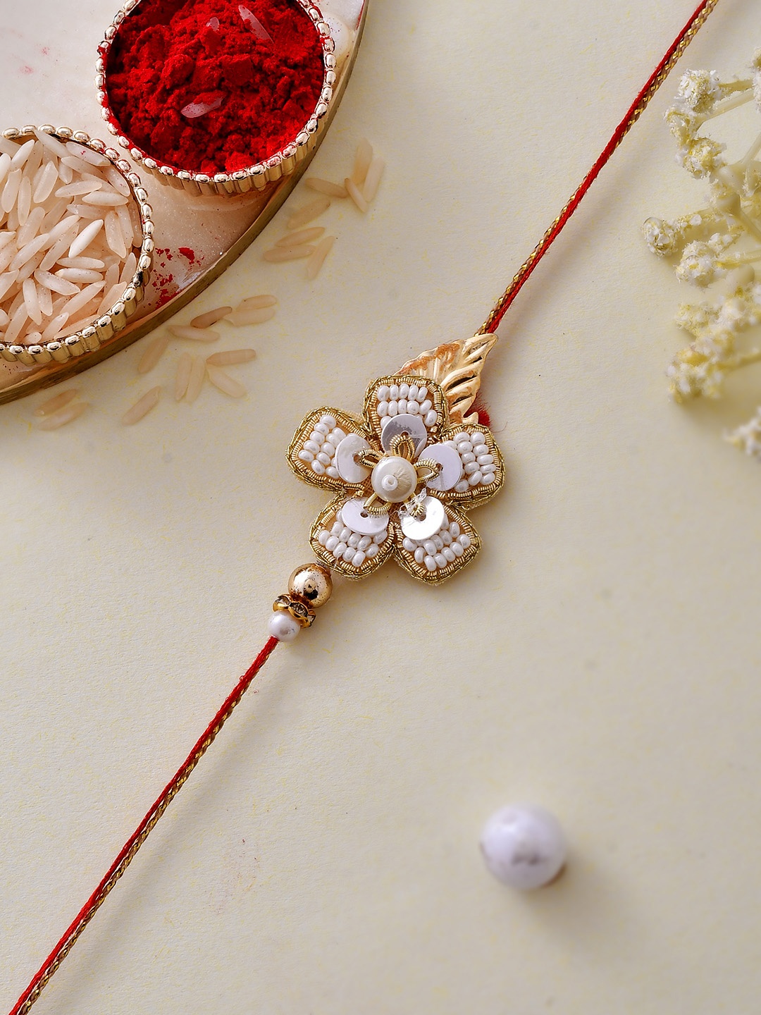 

House of Pataudi Pearl & Sequin Embellished Dazzling Floral Rakhi, Gold