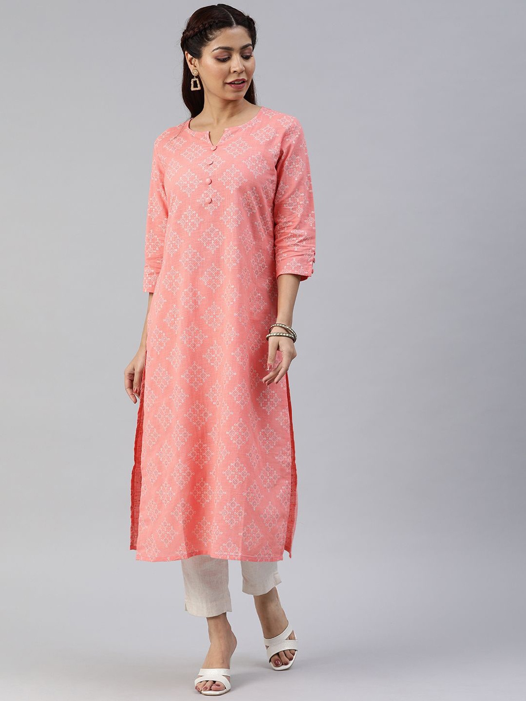 

Swishchick Geometric Printed Notch Neck Three-Quarter Sleeves Cotton Straight Kurta, Peach