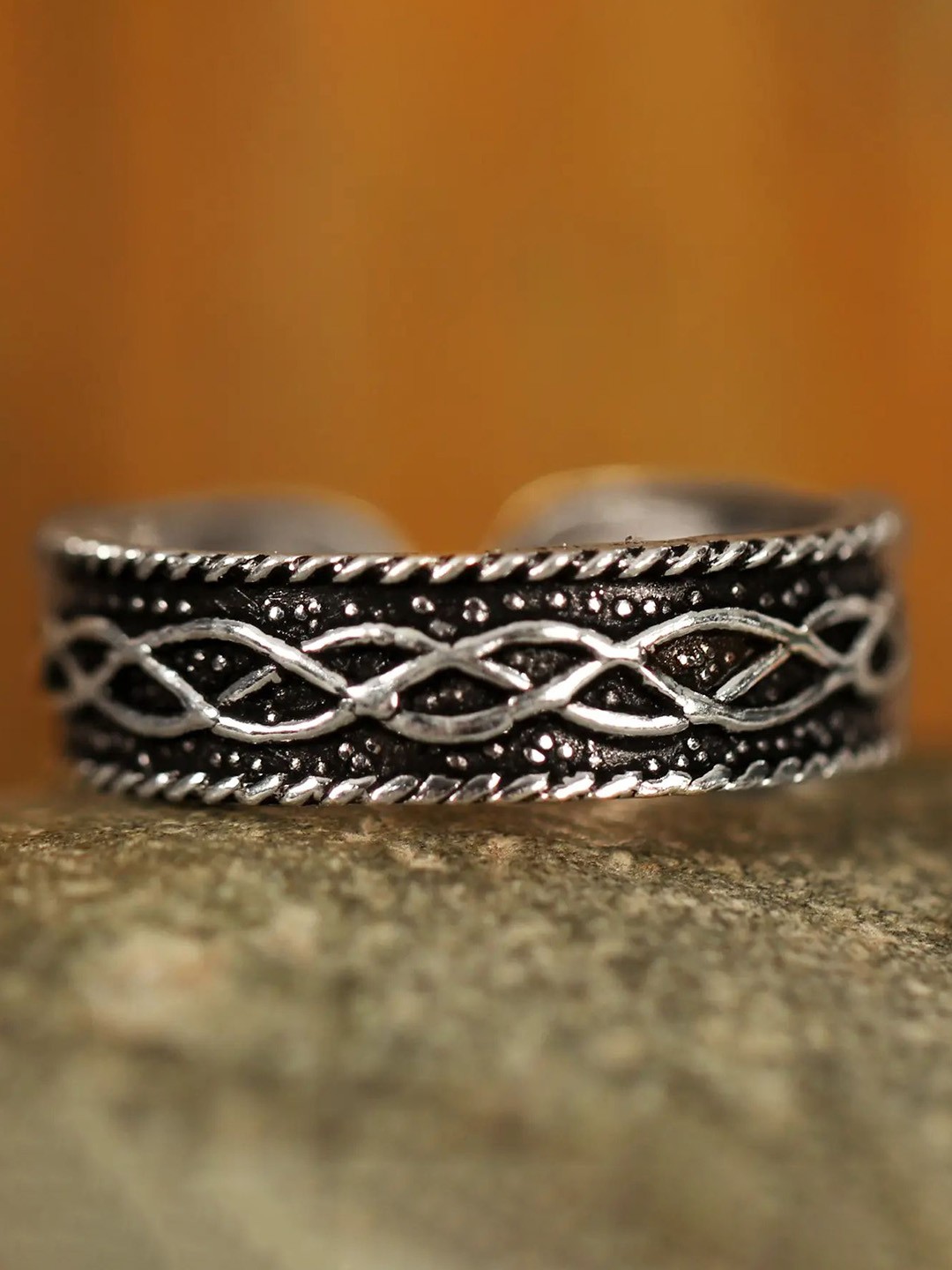 

Exotic India Sterling Silver-Plated Oxidised Adjustable Finger Ring