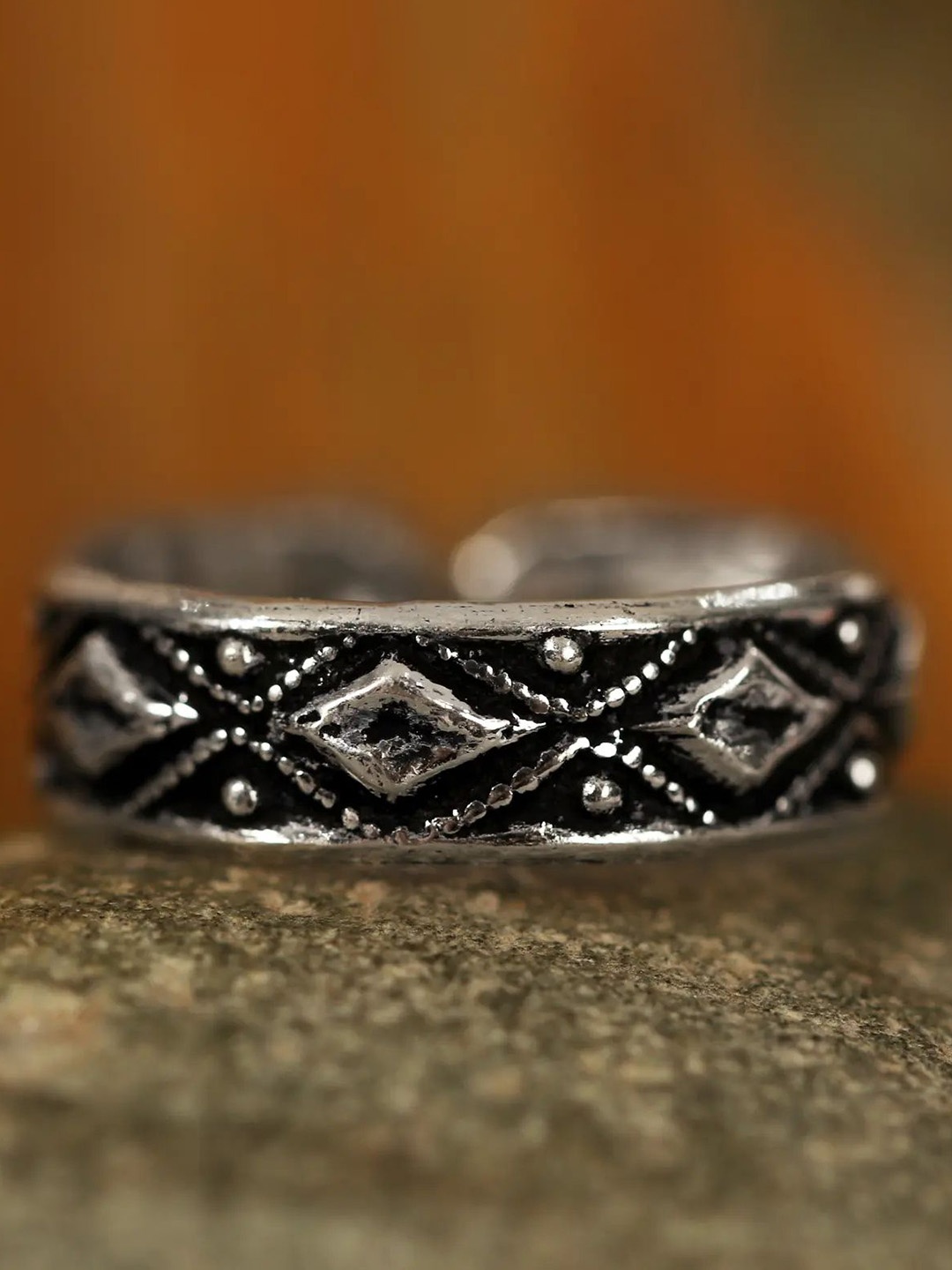 

Exotic India Sterling Silver-Plated Oxidised Adjustable Finger Ring