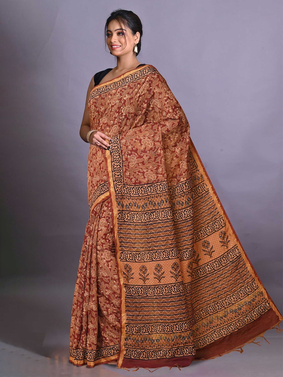 

Unnati Silks Ethnic Motifs Zari Handloom Bagru Saree, Orange