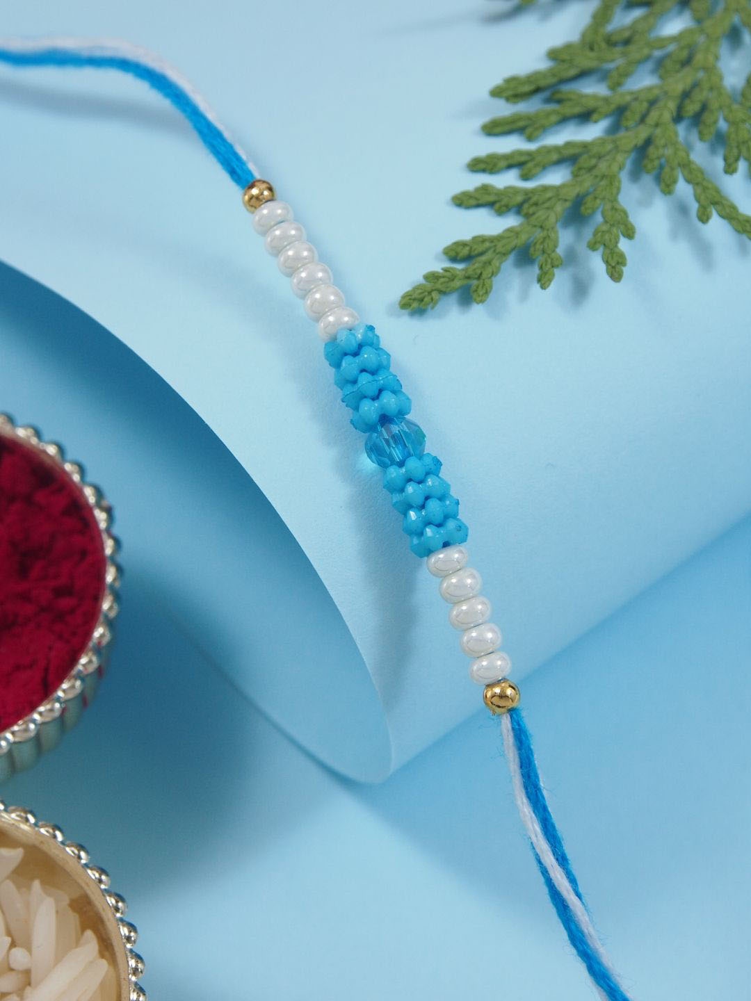 

I Jewels Beaded Thread Rakhi With Roli Chawal & Rakshabandhan Card, Turquoise blue