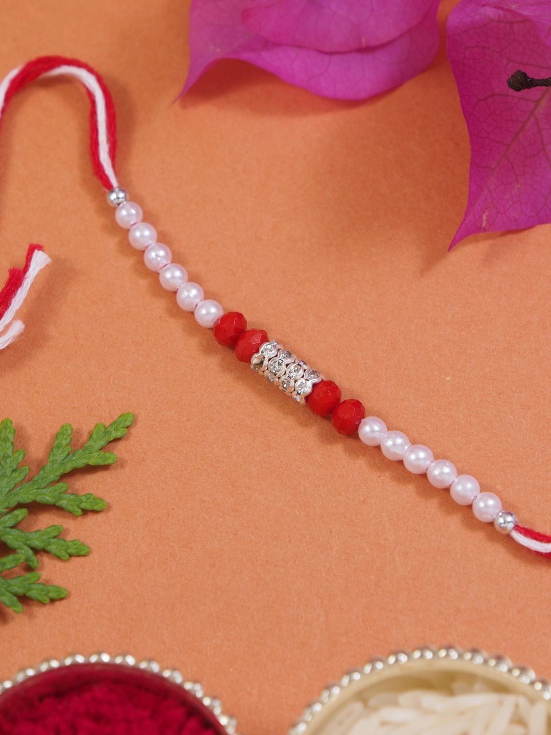 

I Jewels Pearl Thread Rakhi With Roli Chawal & Rakshabandhan Card, Red