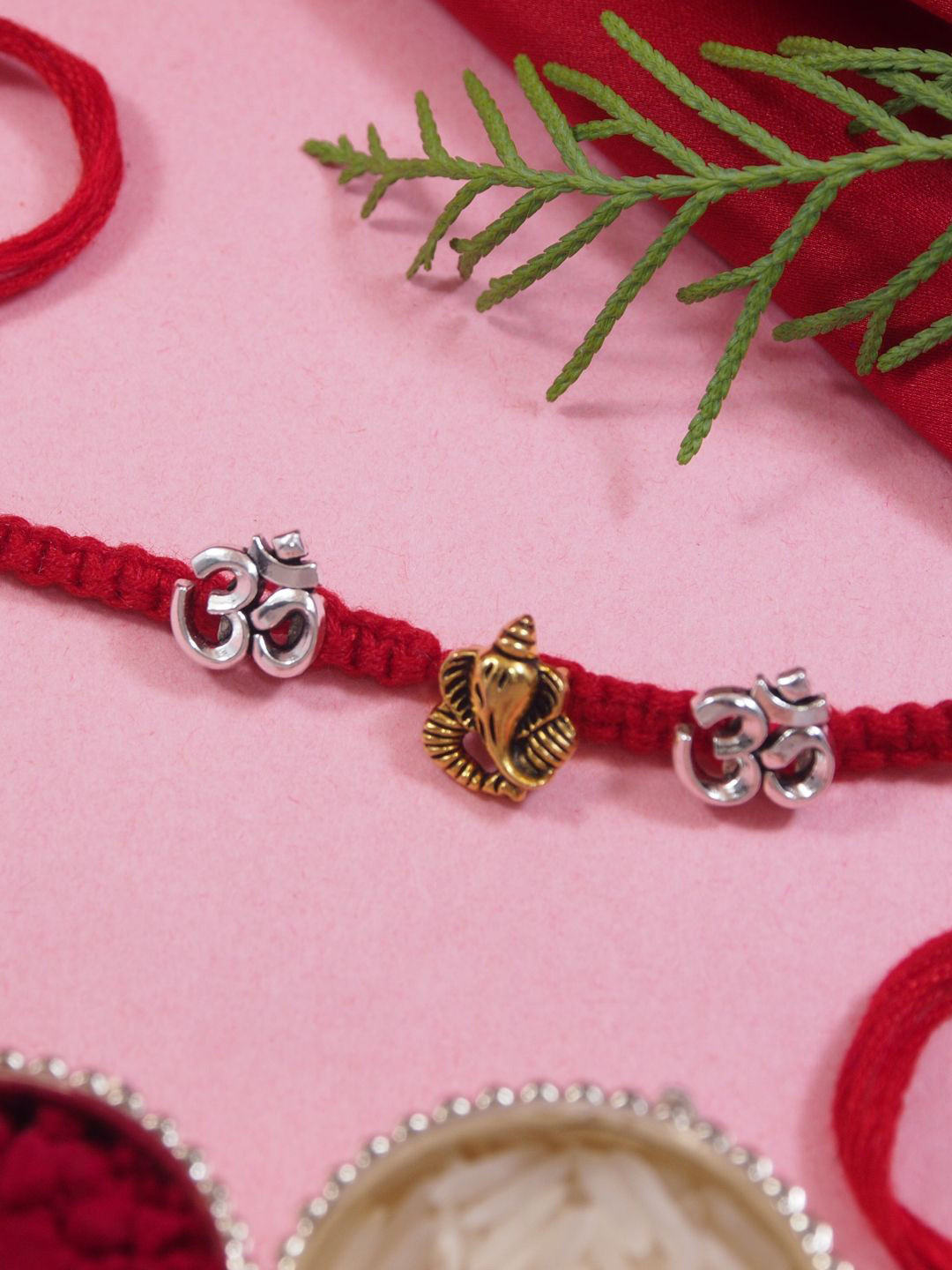 

I Jewels Om Ganpati Thread Rakhi With Roli Chawal & Greeting Card, Red