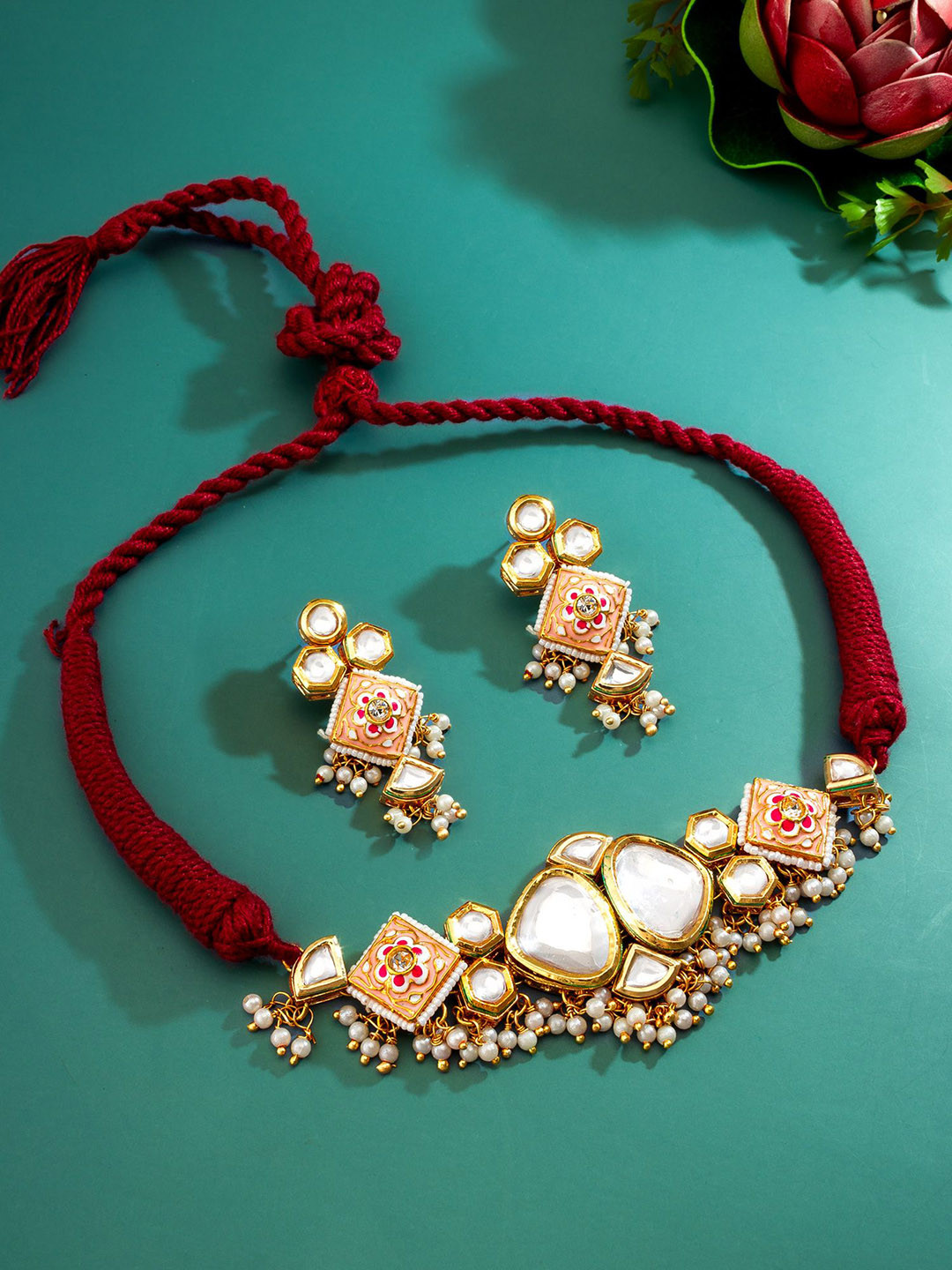 

aadita Gold-Plated Kundan Studded & Beaded Jewellery Set