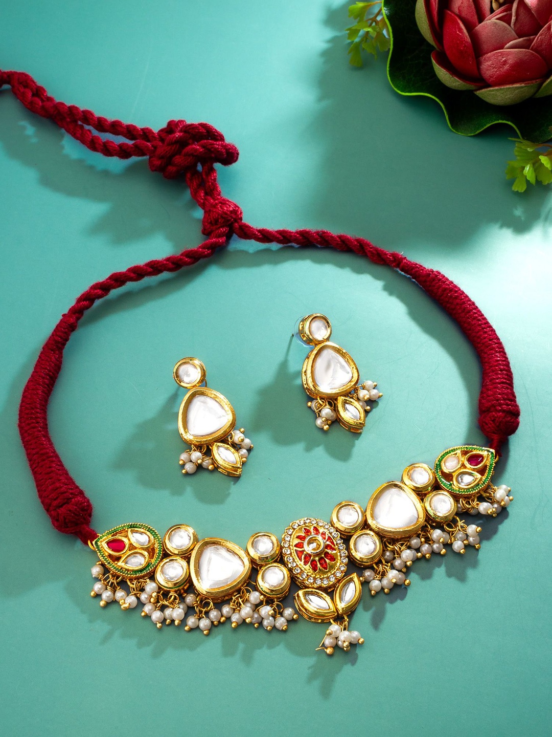 

aadita Gold-Plated Stone Studded & Beaded Jewellery Set