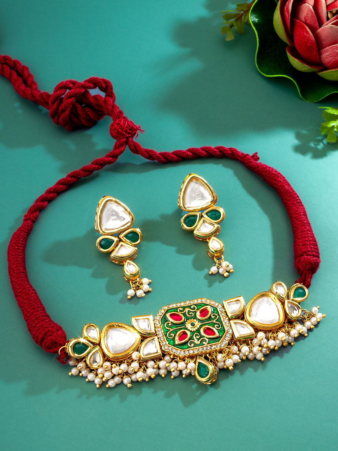 

aadita Gold-Plated Kundan Studded & Beaded Jewellery Set