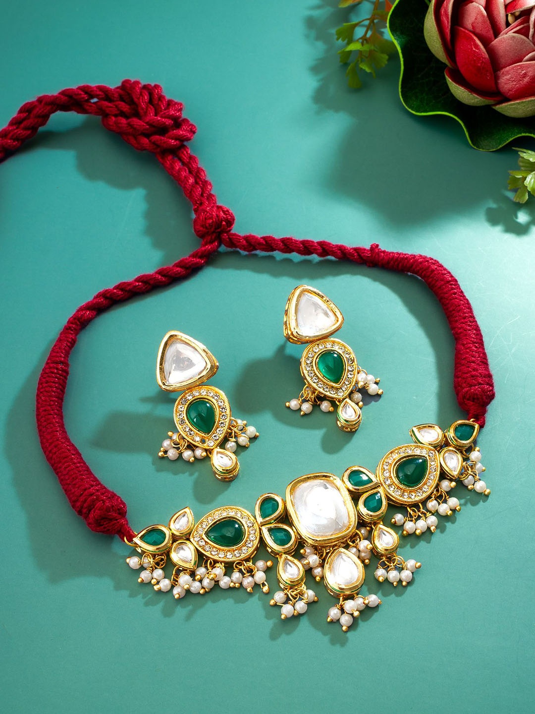 

aadita Gold-Plated Kundan Studded & Beaded Jewellery Set