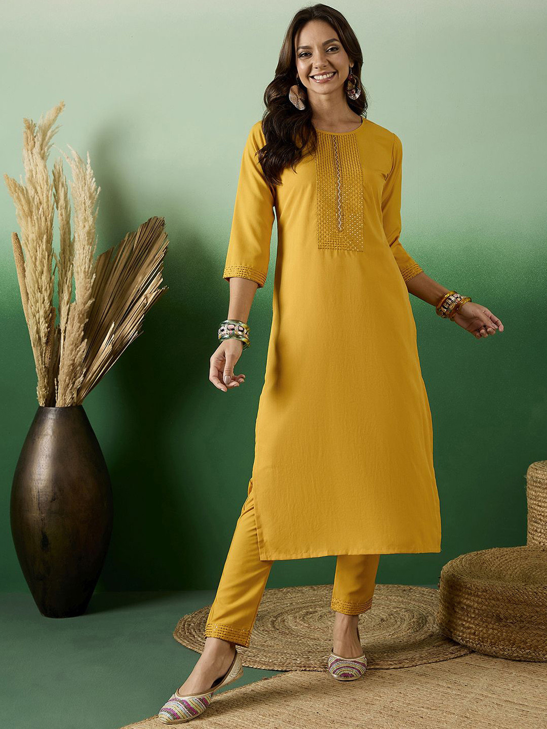 

Sangria Round Neck Embroidered Straight Kurta With Trouser Set, Yellow