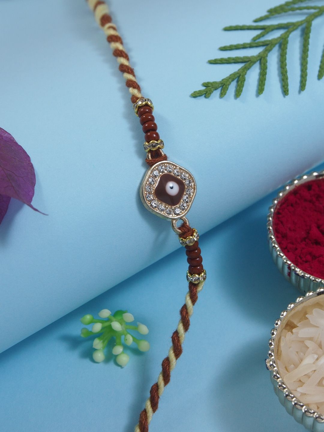 

I Jewels Enamel Evil Eye Thread Rakhi With Roli Chawal & Rakshabandhan Card, Brown