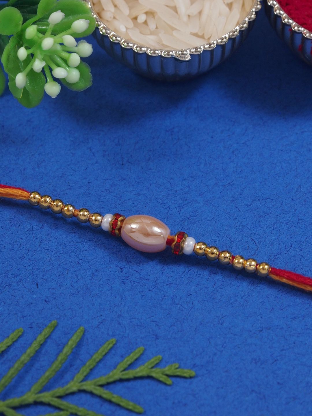 

I Jewels Pearl Thread Rakhi With Roli Chawal & Rakshabandhan Card, Red