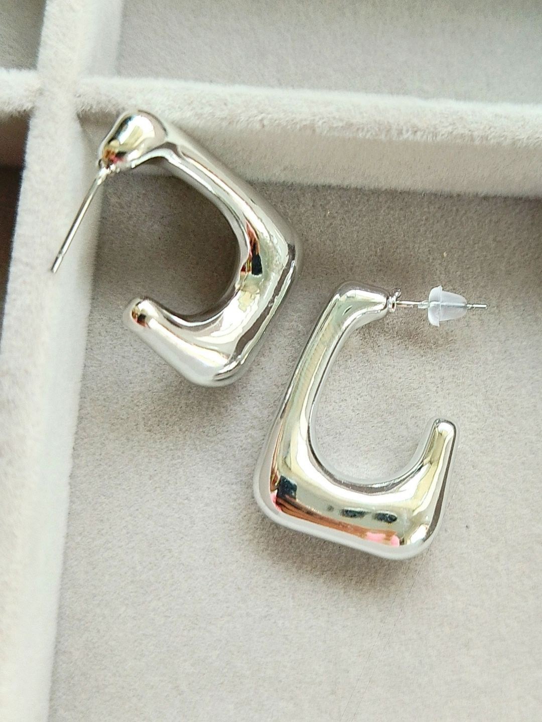 

DressBerry Silver Toned Silver Plated Stainless Steel Half Hoop Earrings