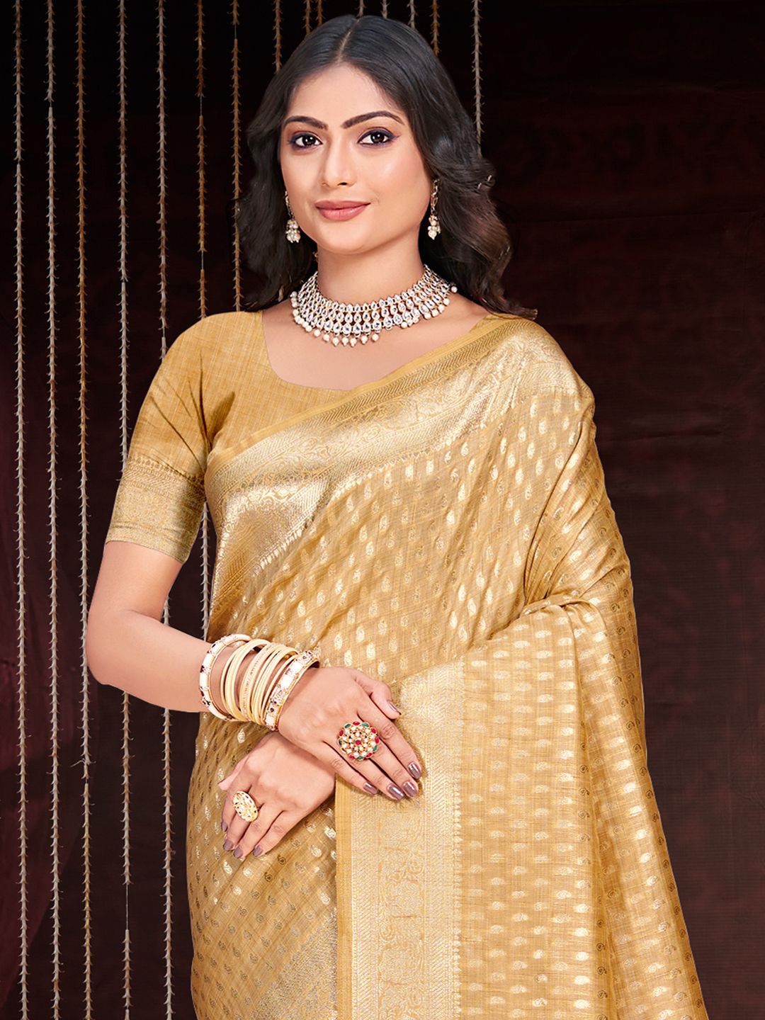 

Ishin Ethnic Motif Zari Woven Tassel Saree with Blouse, Beige