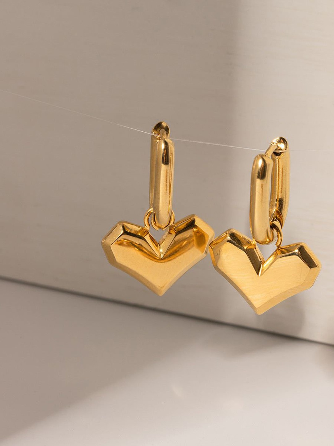 

PALMONAS Peripheral Gold-Plated Teardrop Shaped Hoop Earrings