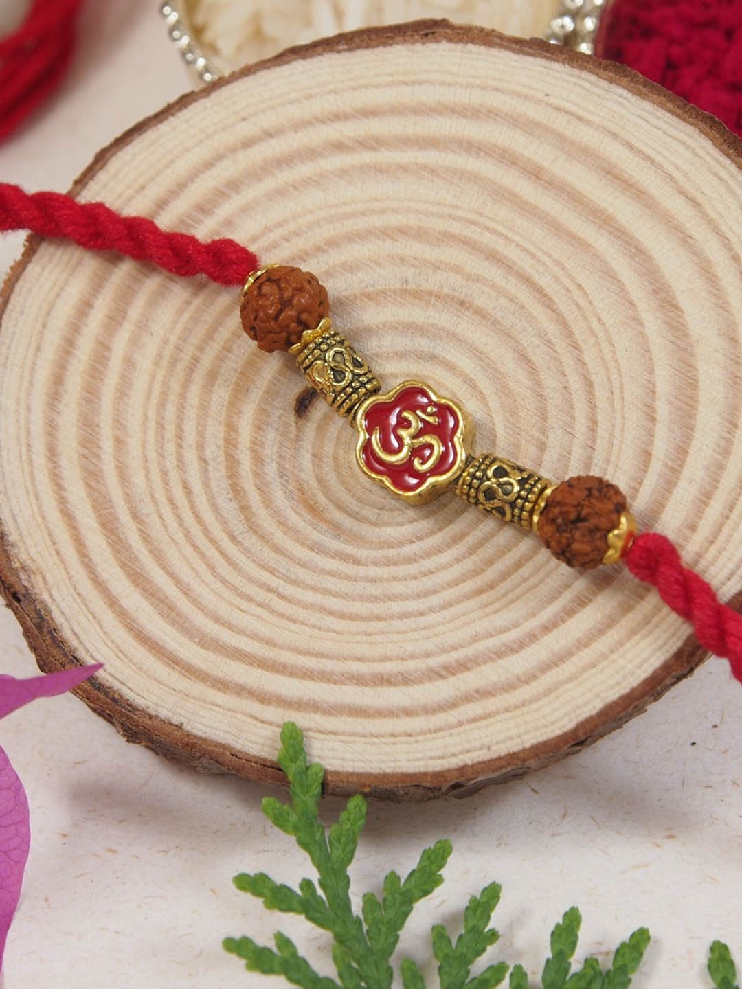 

I Jewels Om Rudraksh Thread Rakhi With Roli Chawal & Greeting Card, Red