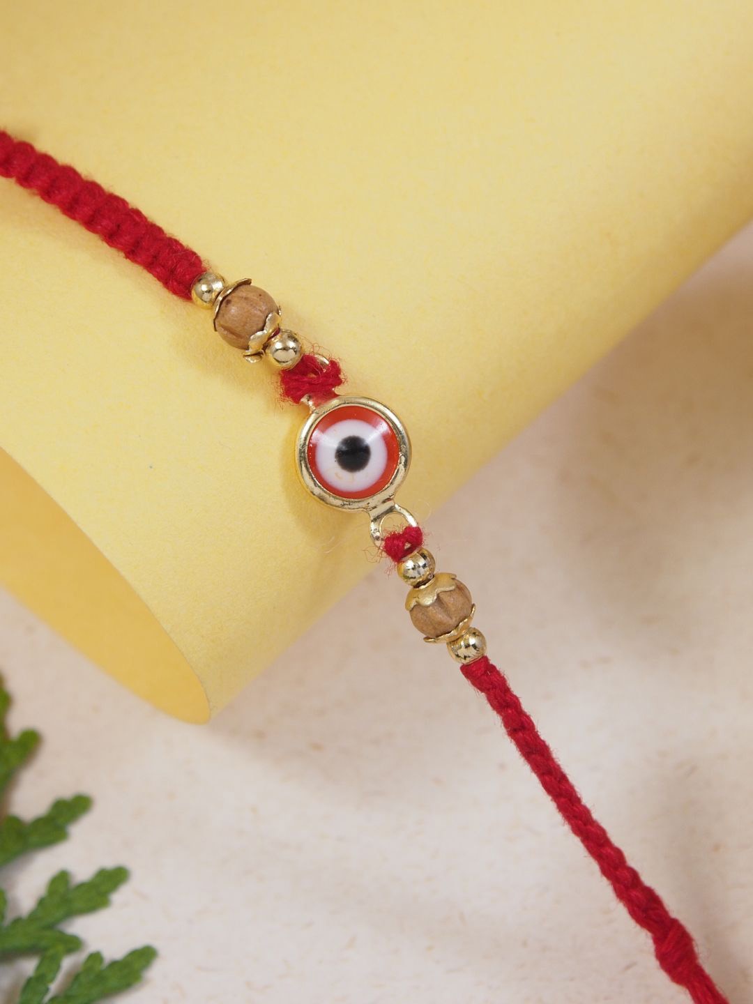 

I Jewels Enamel Evil Eye Thread Rakhi With Roli Chawal & Rakshabandhan Card, Red