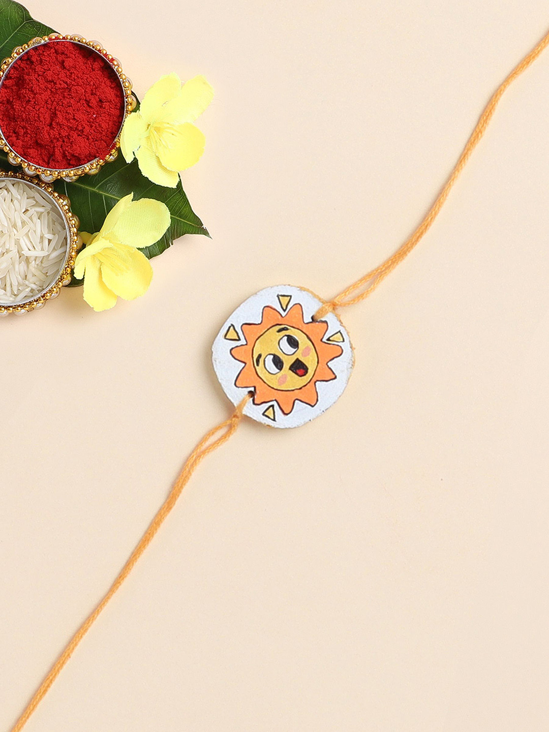 

The Magic Wand Sun Printed Wooded Thread Rakhi, Yellow