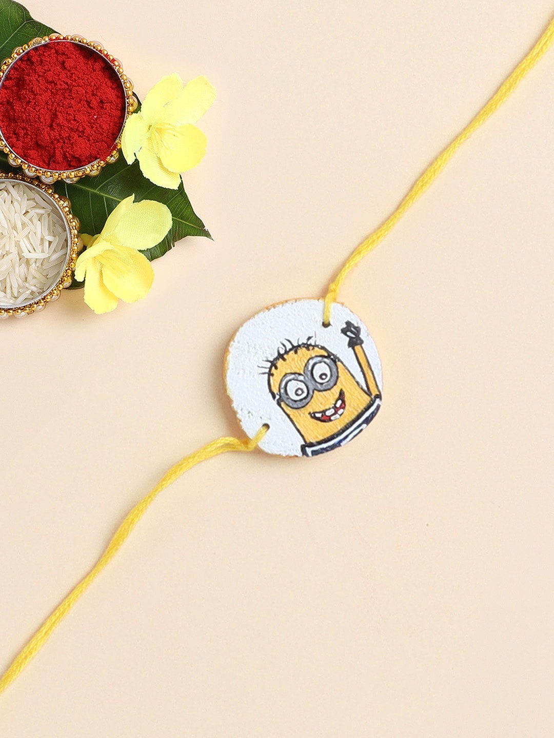 

The Magic Wand Minion Printed Wooded Thread Rakhi, Yellow
