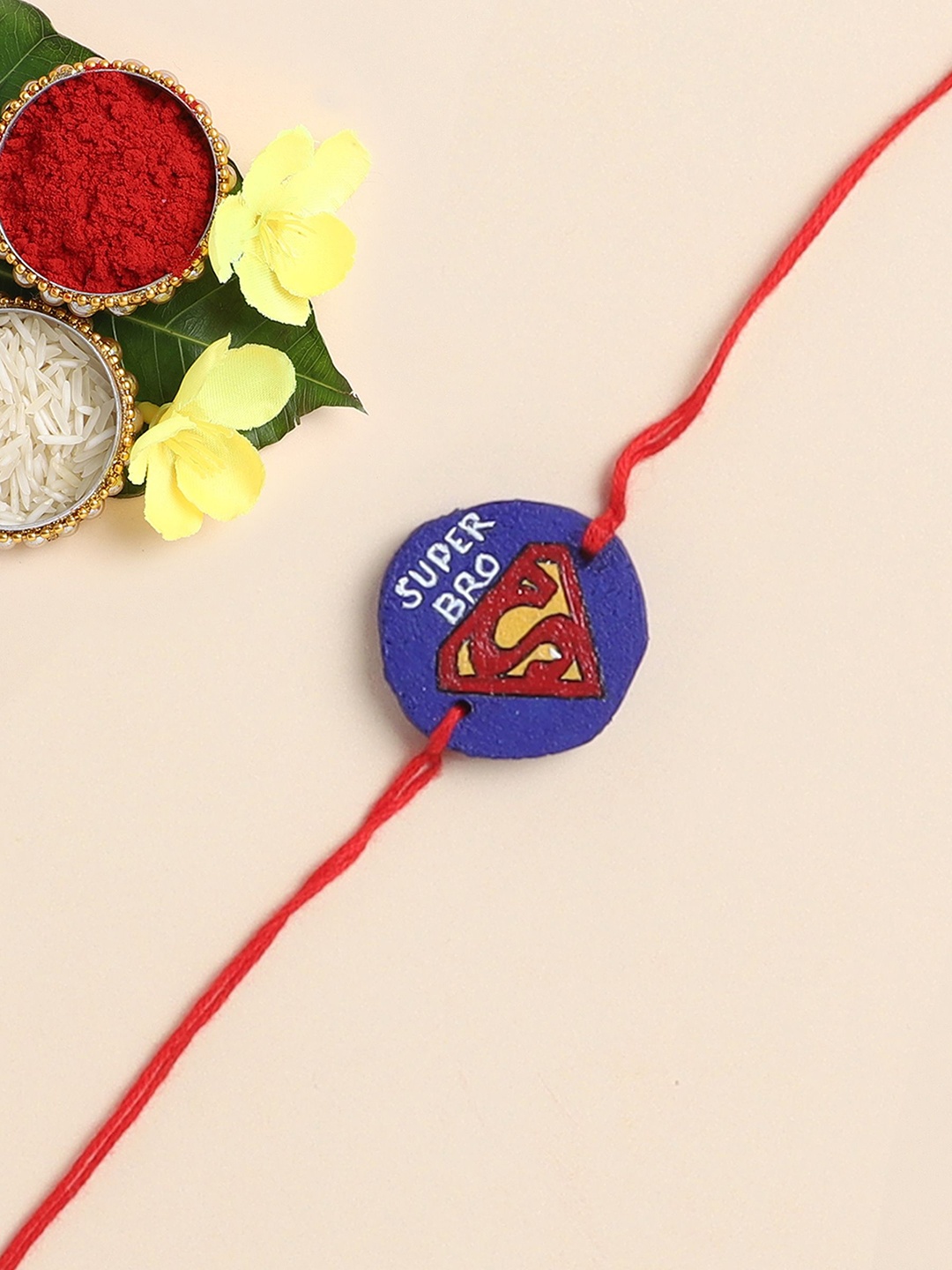 

The Magic Wand Superhero Printed Wooded Thread Rakhi, Blue