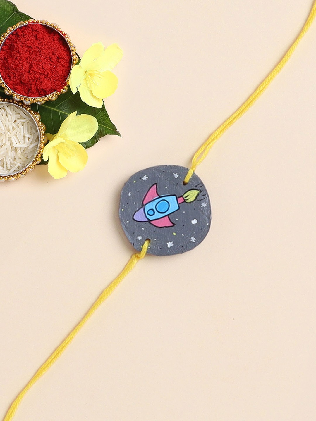 

The Magic Wand Printed Wooded Thread Rakhi, Yellow