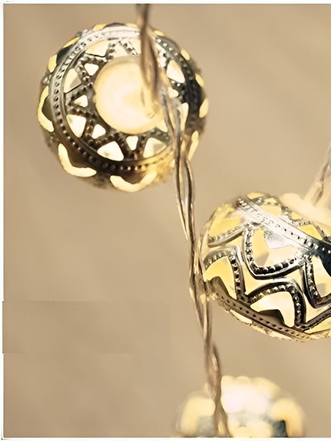 

ENORMITY Gold Toned Textured Cylinder Shape String Lights