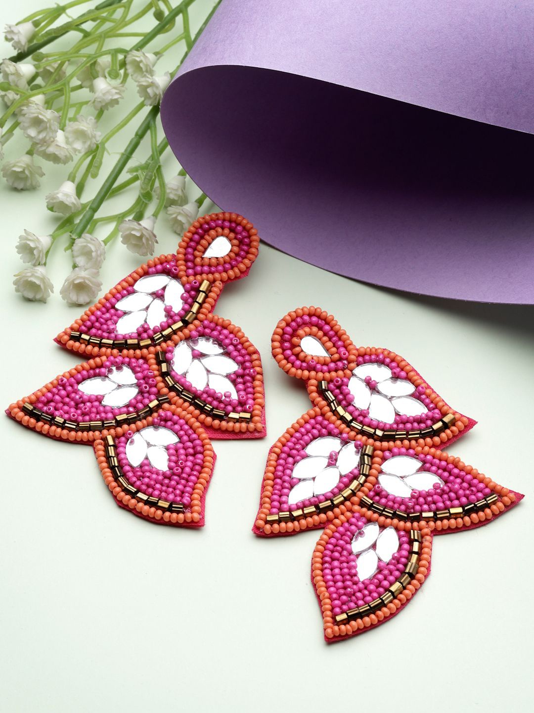 

Moedbuille Silver Plated Leaf Shaped Artificial Stones And Beads Studded Drop Earrings, Pink