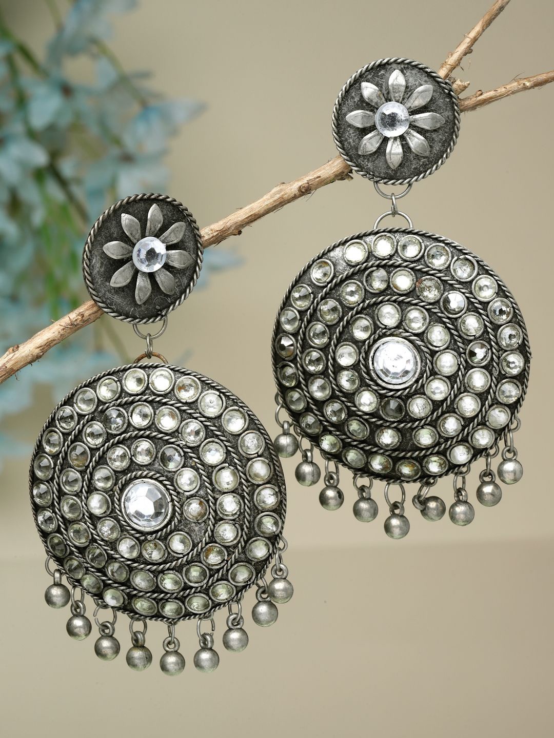 

Moedbuille Silver-Plated Crystals Studded Circular Oxidised Drop Earrings