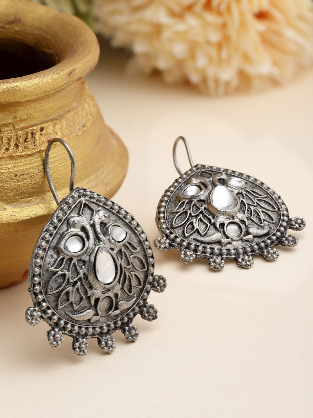 

Moedbuille Silver-Plated Crystals Studded Teardrop Shaped Oxidised Drop Earrings