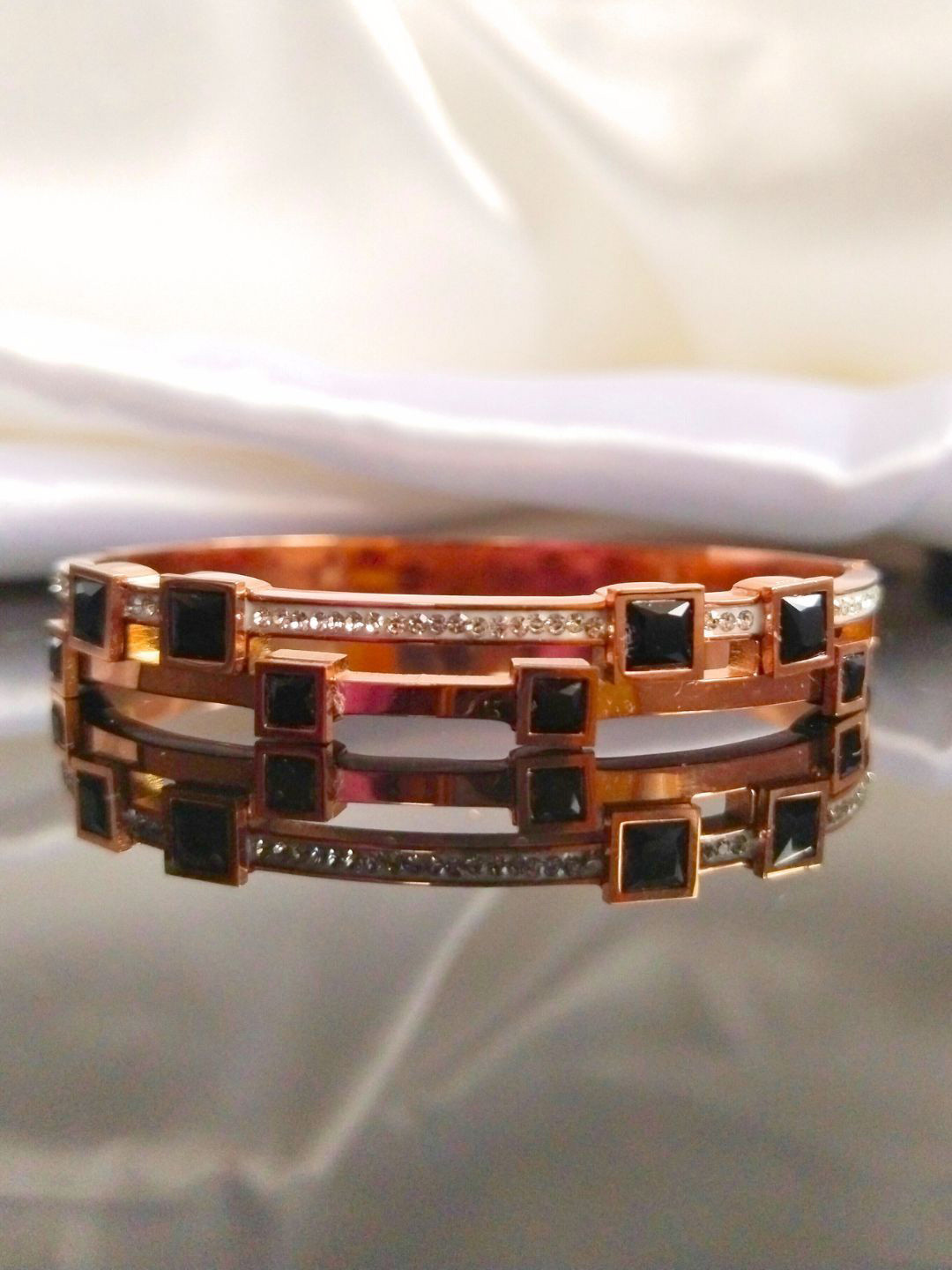 

DressBerry Rose Gold-Plated American Diamond-Studded Stainless Steel Bangle-Style Bracelet