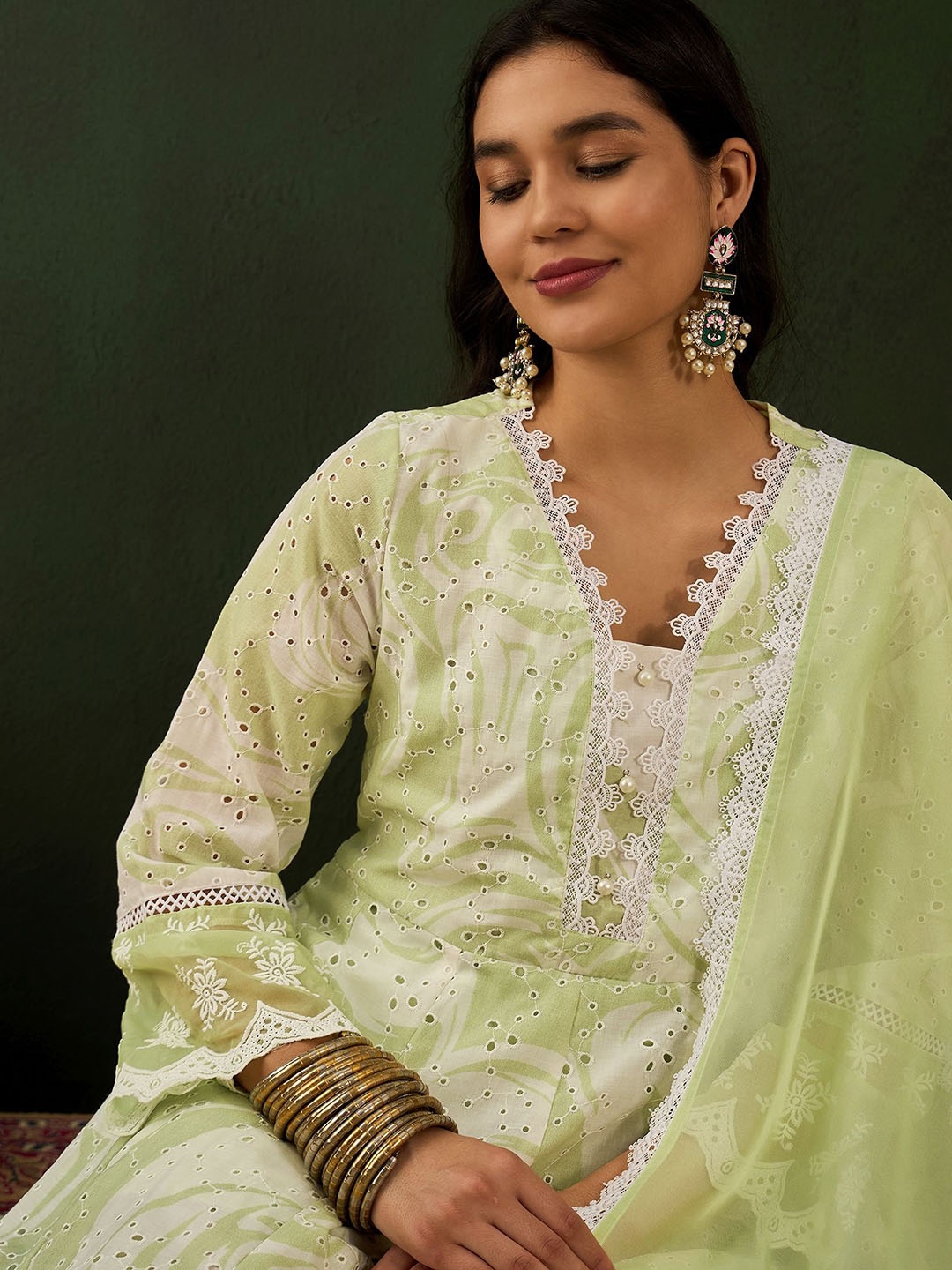 

Sangria Green Abstract Printed V-Neck Schiffli Work Anarkali Kurta With Trousers & Dupatta