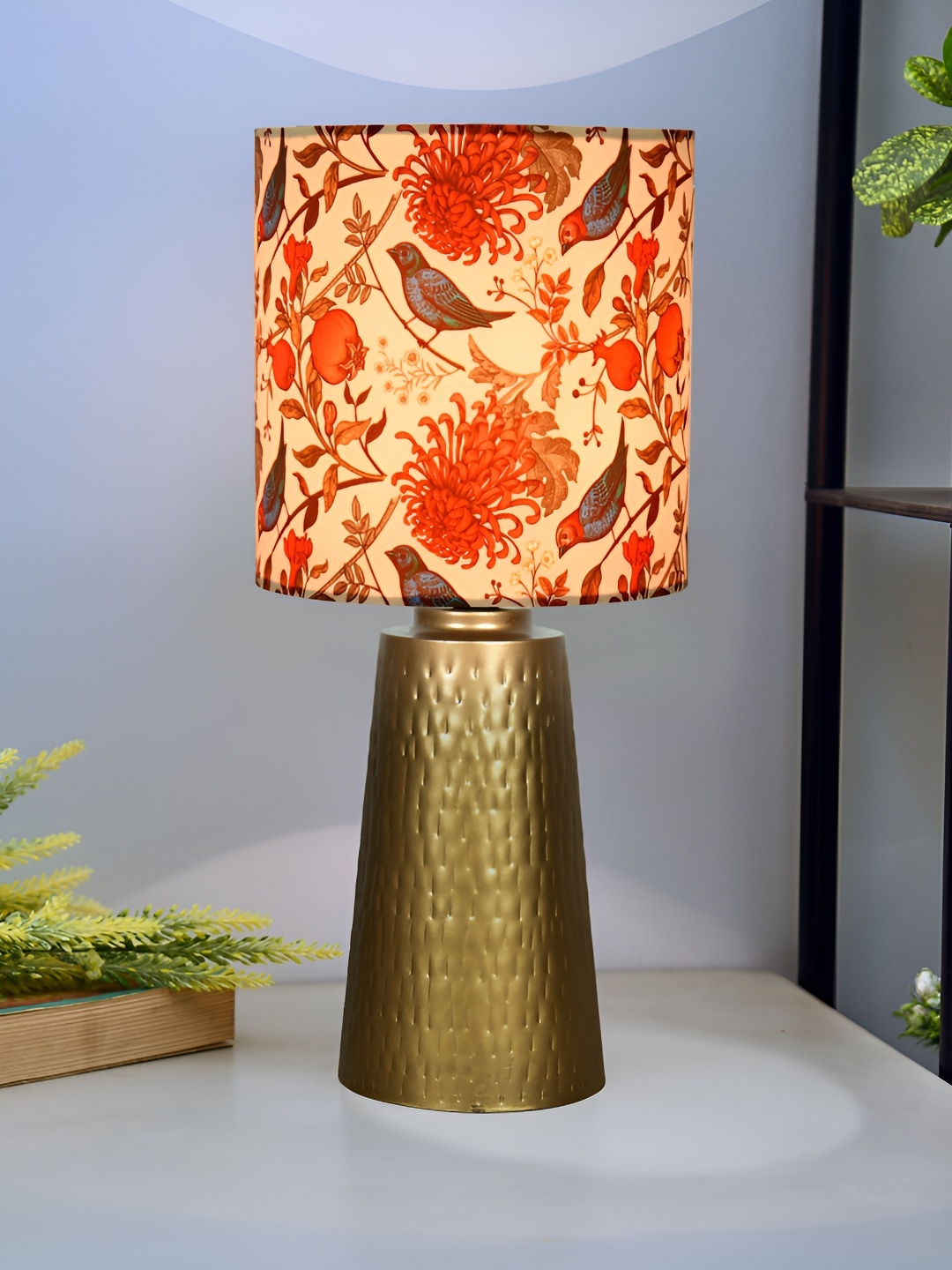 

Homesake Gold Toned & Red Printed Metal Cylindrical Shaped Table Lamp With Bulb