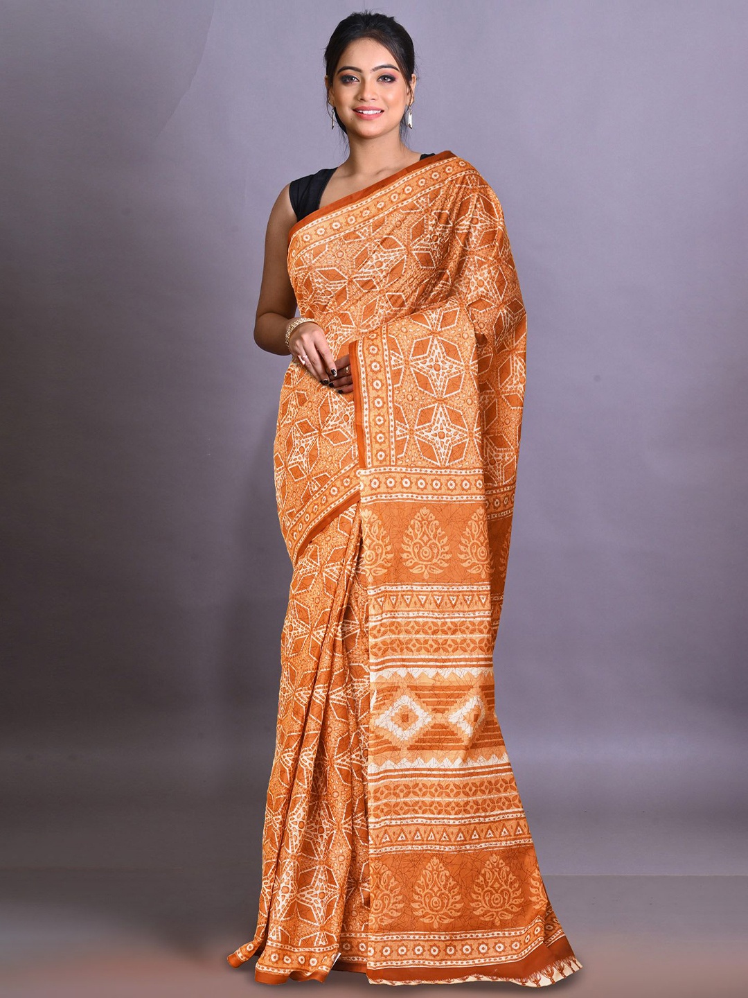 

Unnati Silks Geometric Pure Cotton Handloom Block Print Saree, Orange