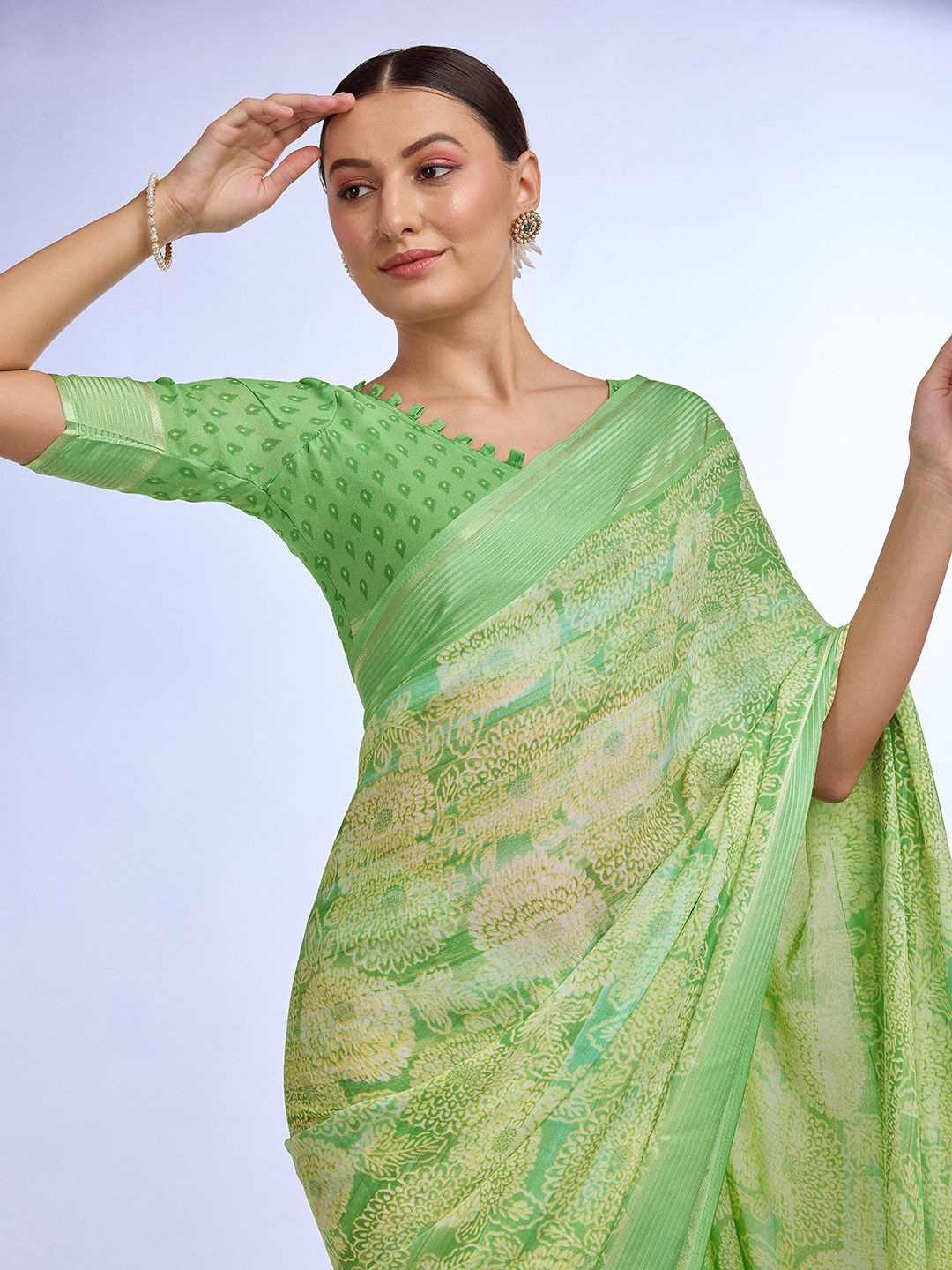 

Mitera Ethnic Motif Zari Woven Pure Georgette Saree, Green