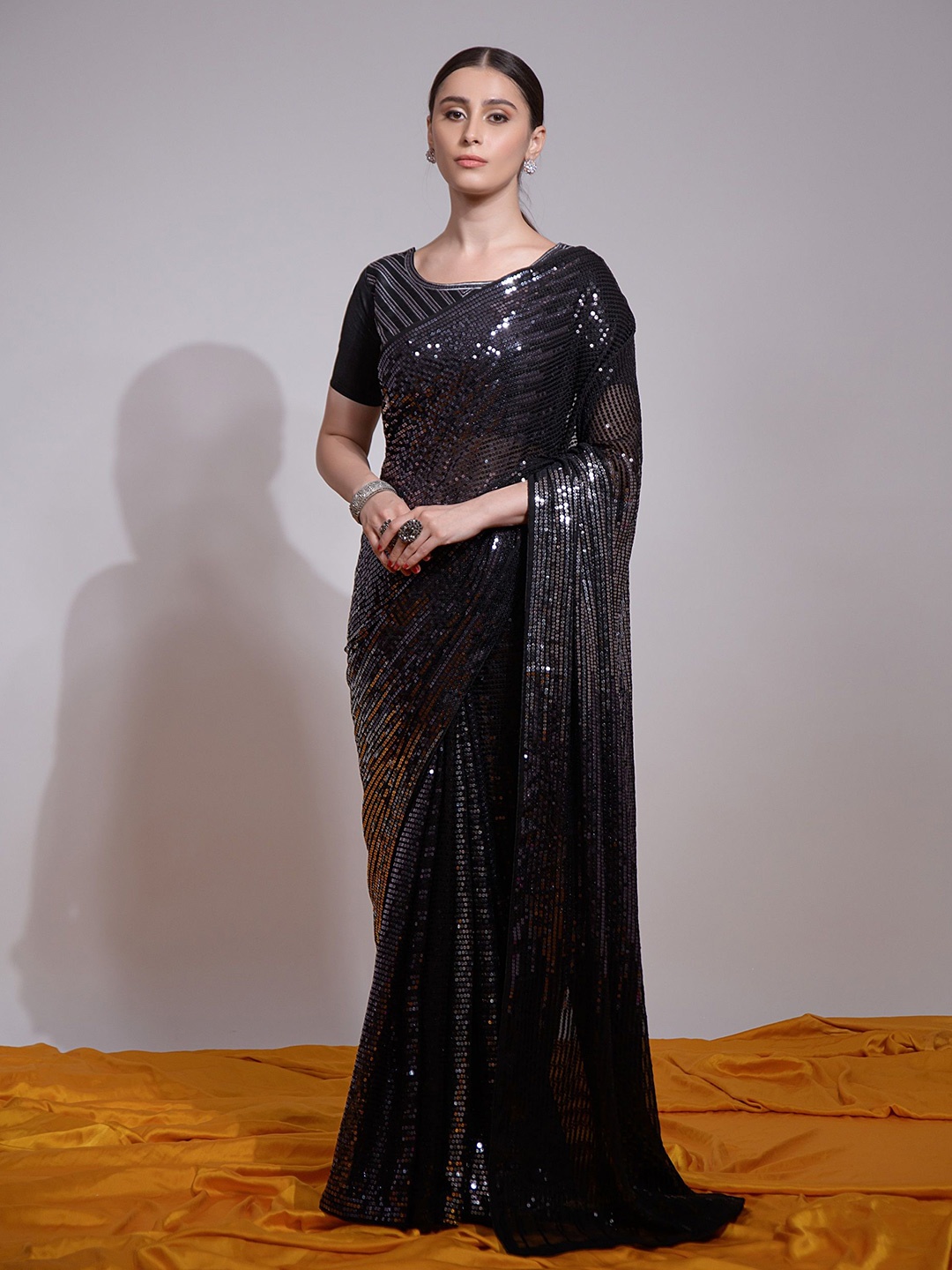 

KALINI Embellished Sequinned Pure Georgette Saree, Silver