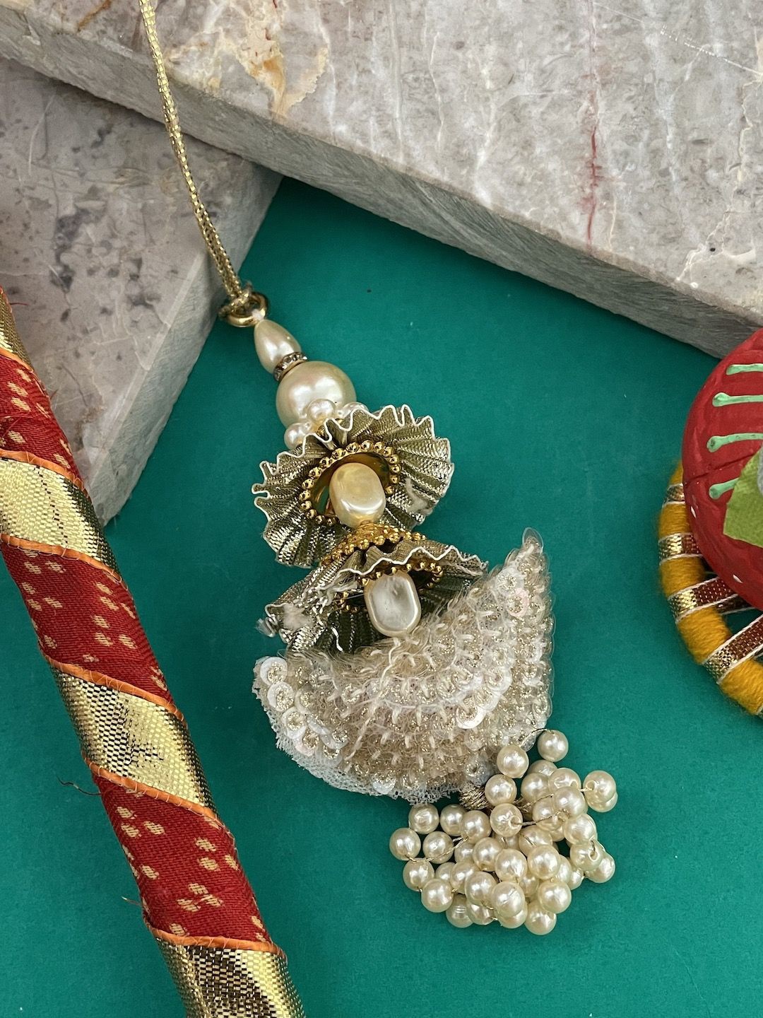 

Digital Dress Room Pearl Beaded Lumba Thread Rakhi, Gold
