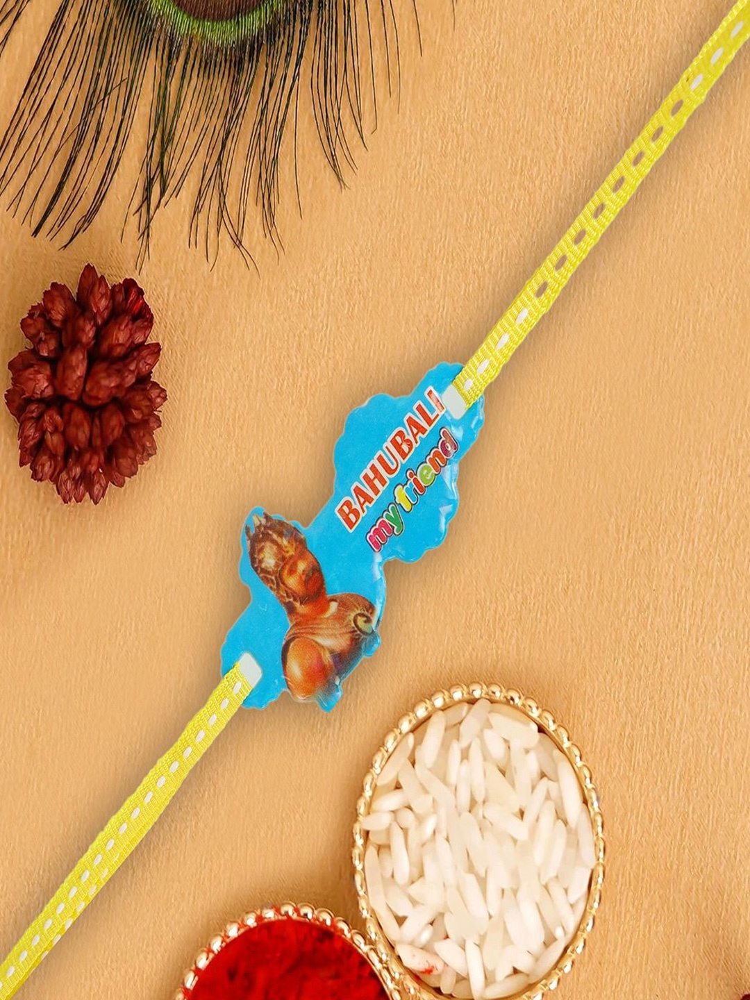 

UNIVERSITY TRENDZ Kids Bhabhubali Thread Rakhi With Roli & Chawal, Blue