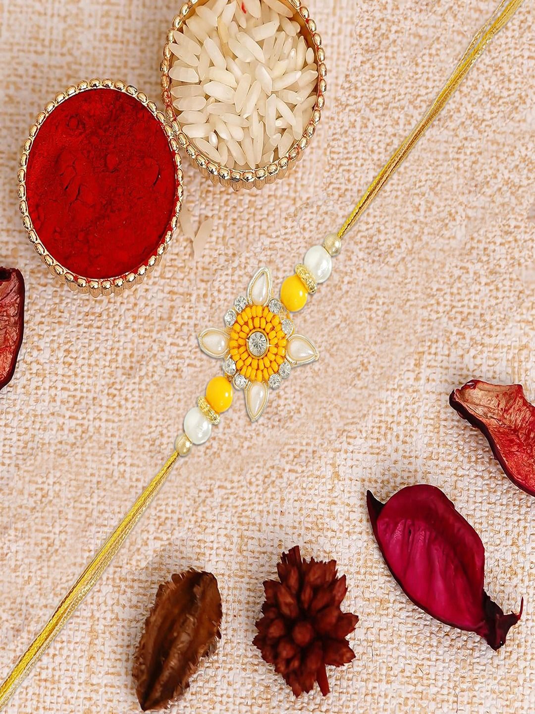 

UNIVERSITY TRENDZ Floral Motifs & Studded Thread Rakhi With Roli Chawal, Yellow