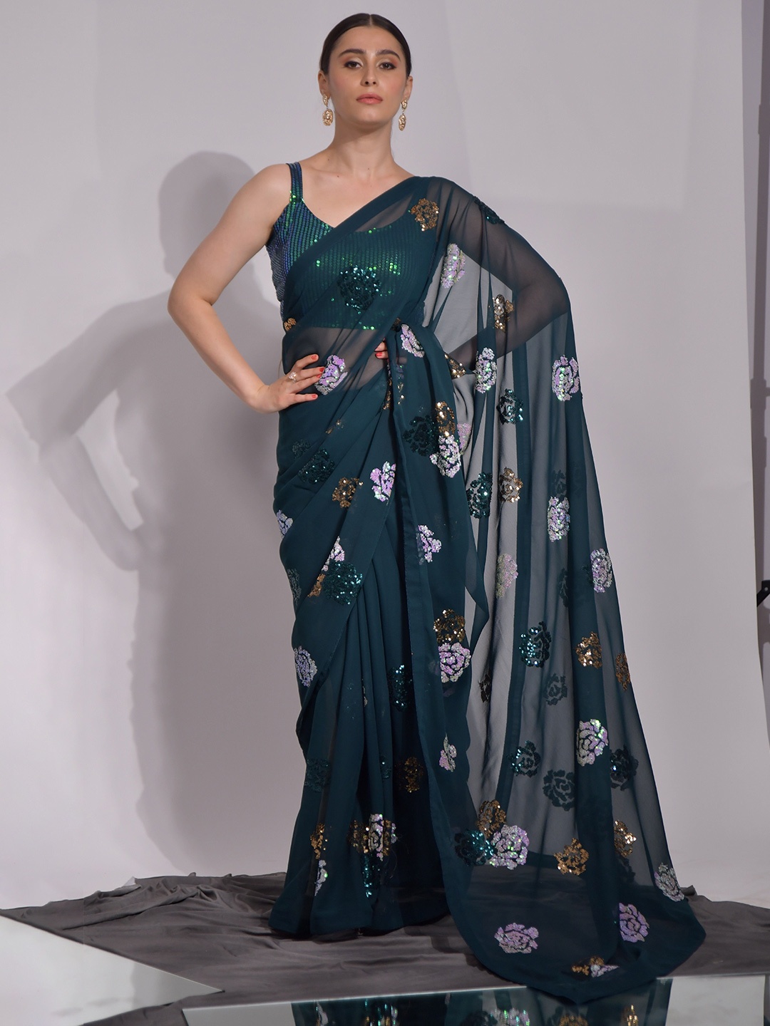 

Manu Designer Floral Pure Georgette Saree, Teal