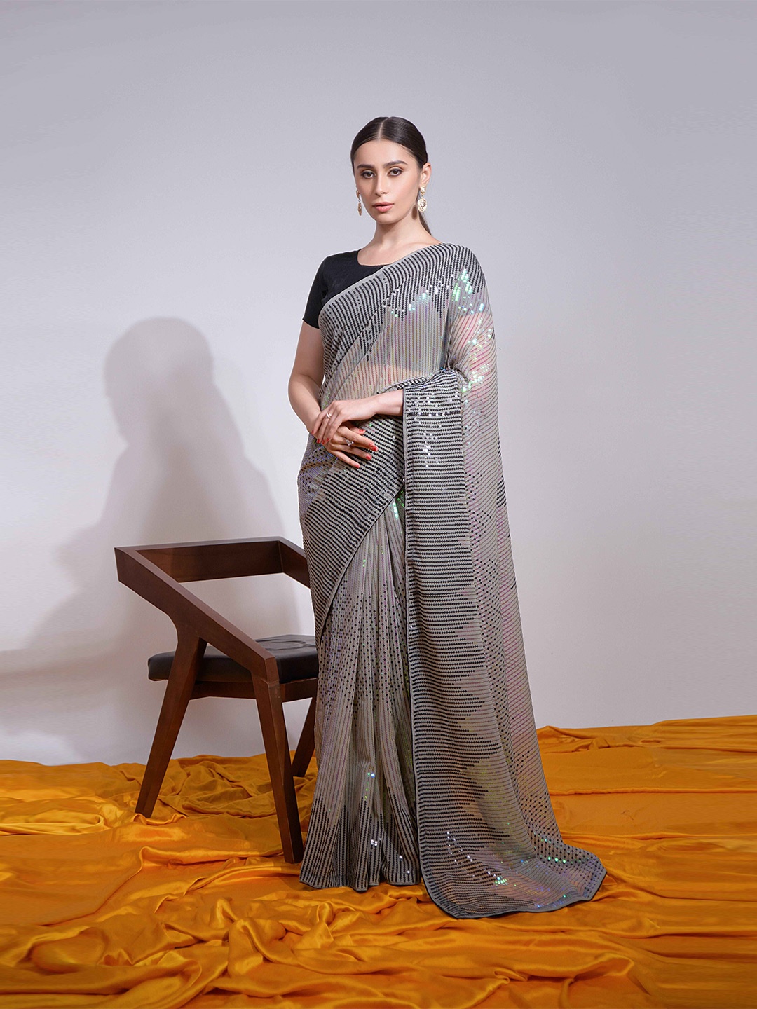 

Manu Designer Striped Sequinned Pure Georgette Saree, Black