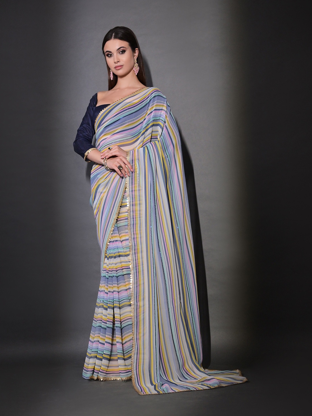 

Manu Designer Striped Sequinned Pure Georgette Saree, Blue