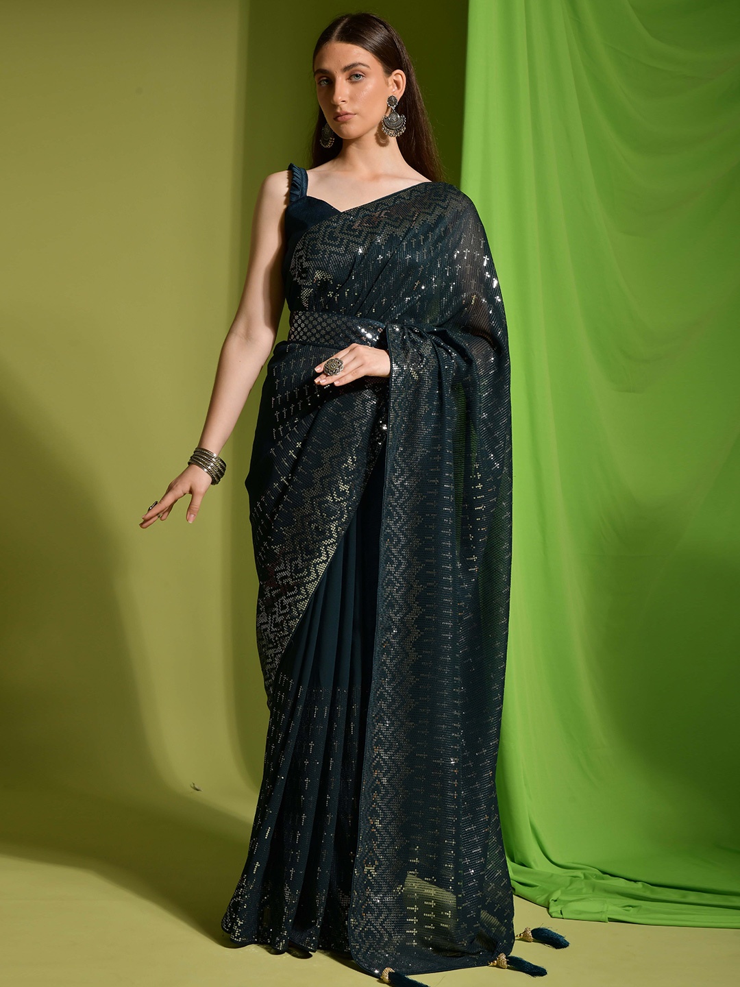 

Manu Designer Women Striped Sequinned Pure Georgette Saree, Green