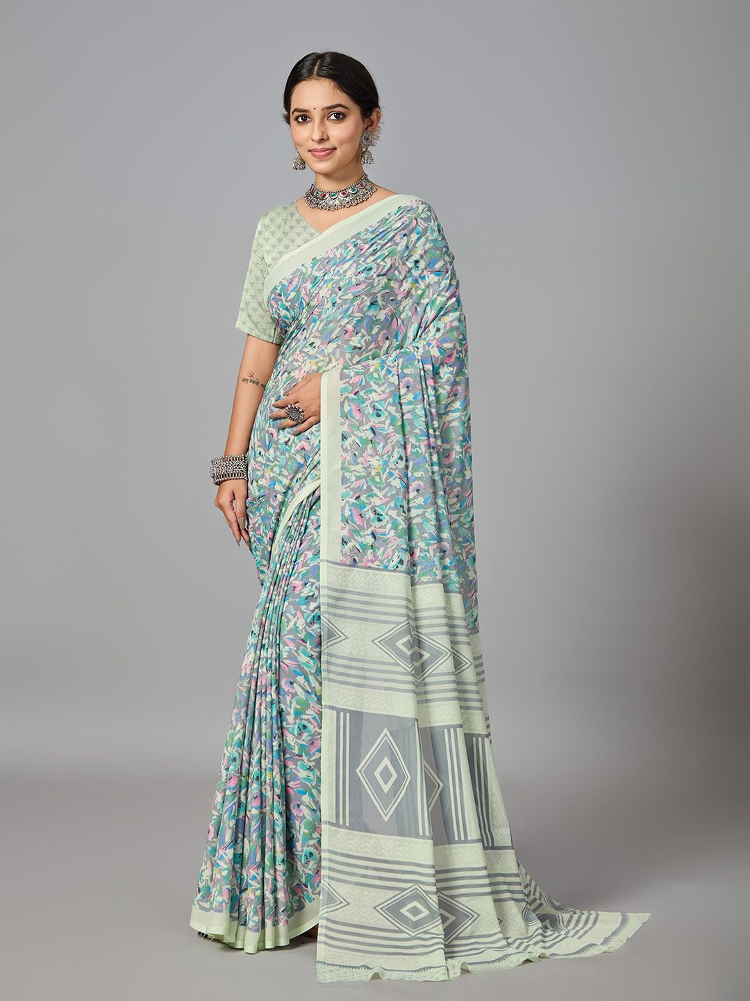 

NIRMAL CREATION Floral Solid Border Saree, Green