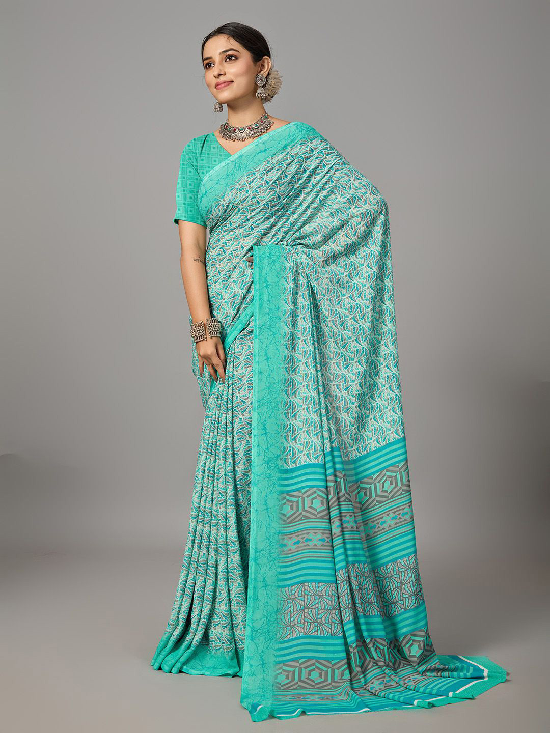 

NIRMAL CREATION Geometric Saree With Blouse Piece, Blue