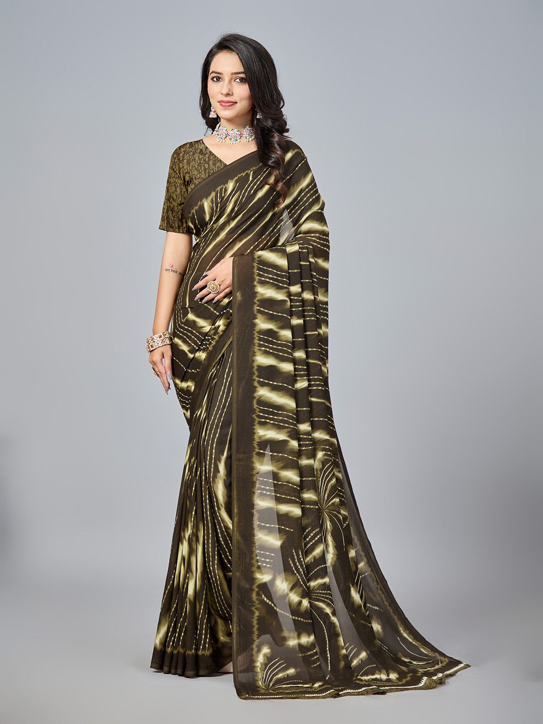 

NIRMAL CREATION Striped Printed Saree, Brown
