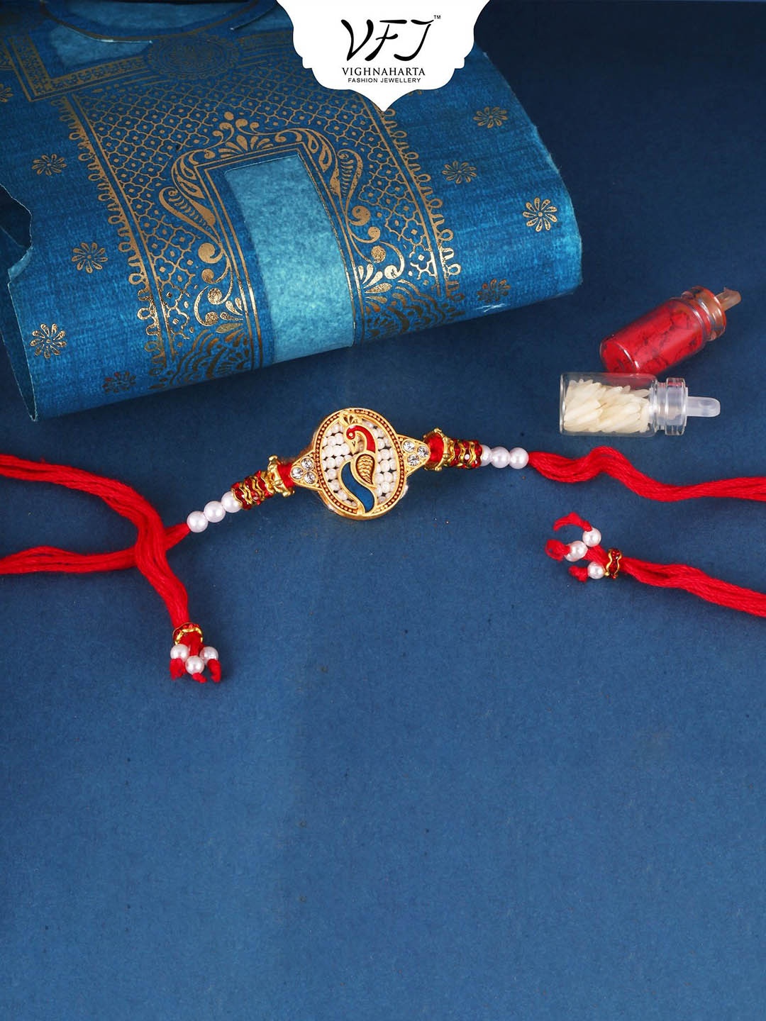 

Vighnaharta Boys Gold And Rhodium Plated Mayur Pankh Peacock Thread Rakhi, Red