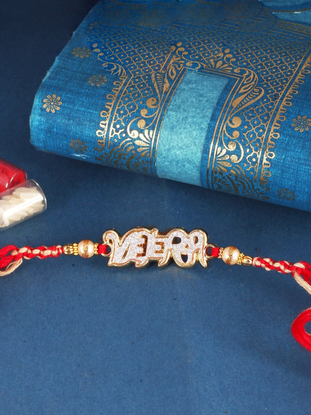 

Vighnaharta Gold and Rhodium Plated VEERA Beaded Thread Rakhi, Red