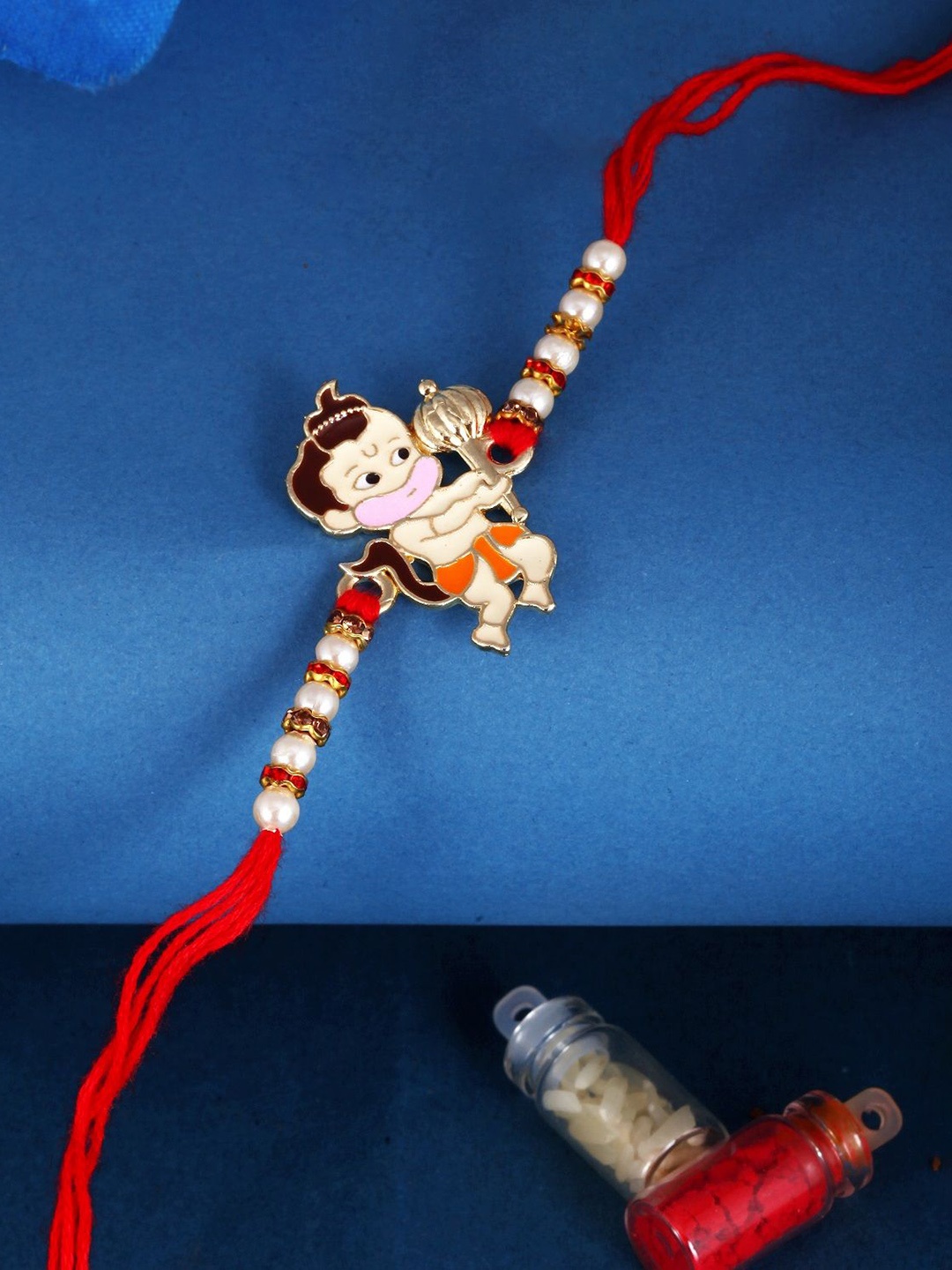 

Vighnaharta Gold and Rhodium Plated Bal Hanuman Beaded Thread Rakhi