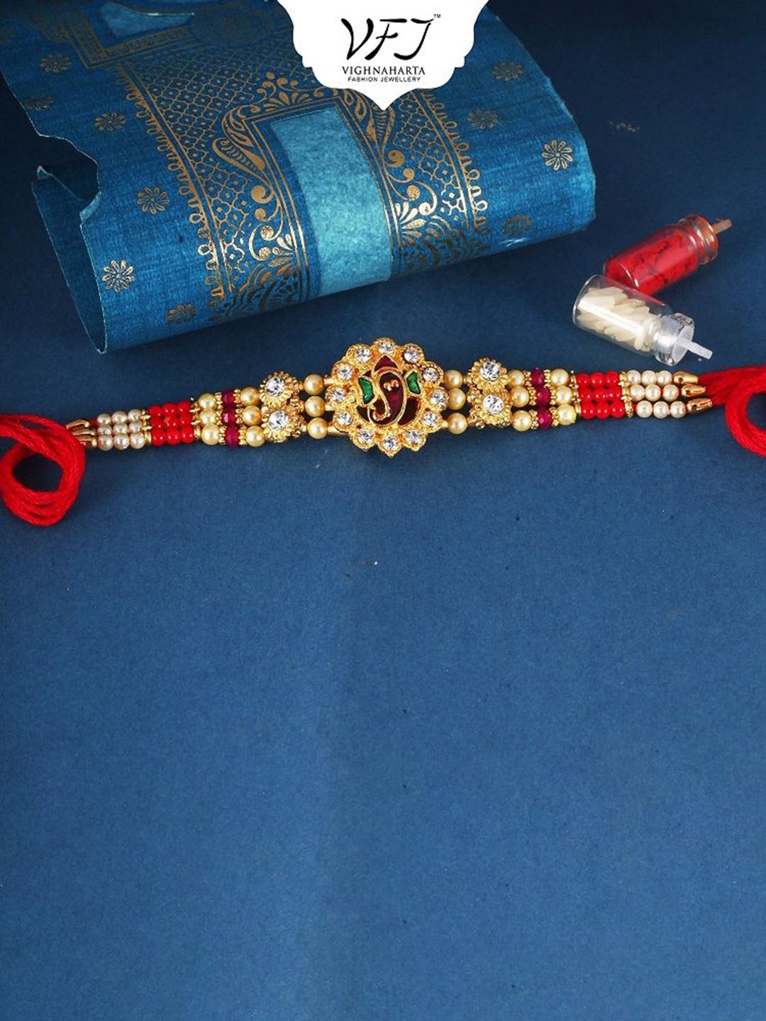 

Vighnaharta Boys Gold And Rhodium Plated CZ Stone Studded Thread Rakhi, Red