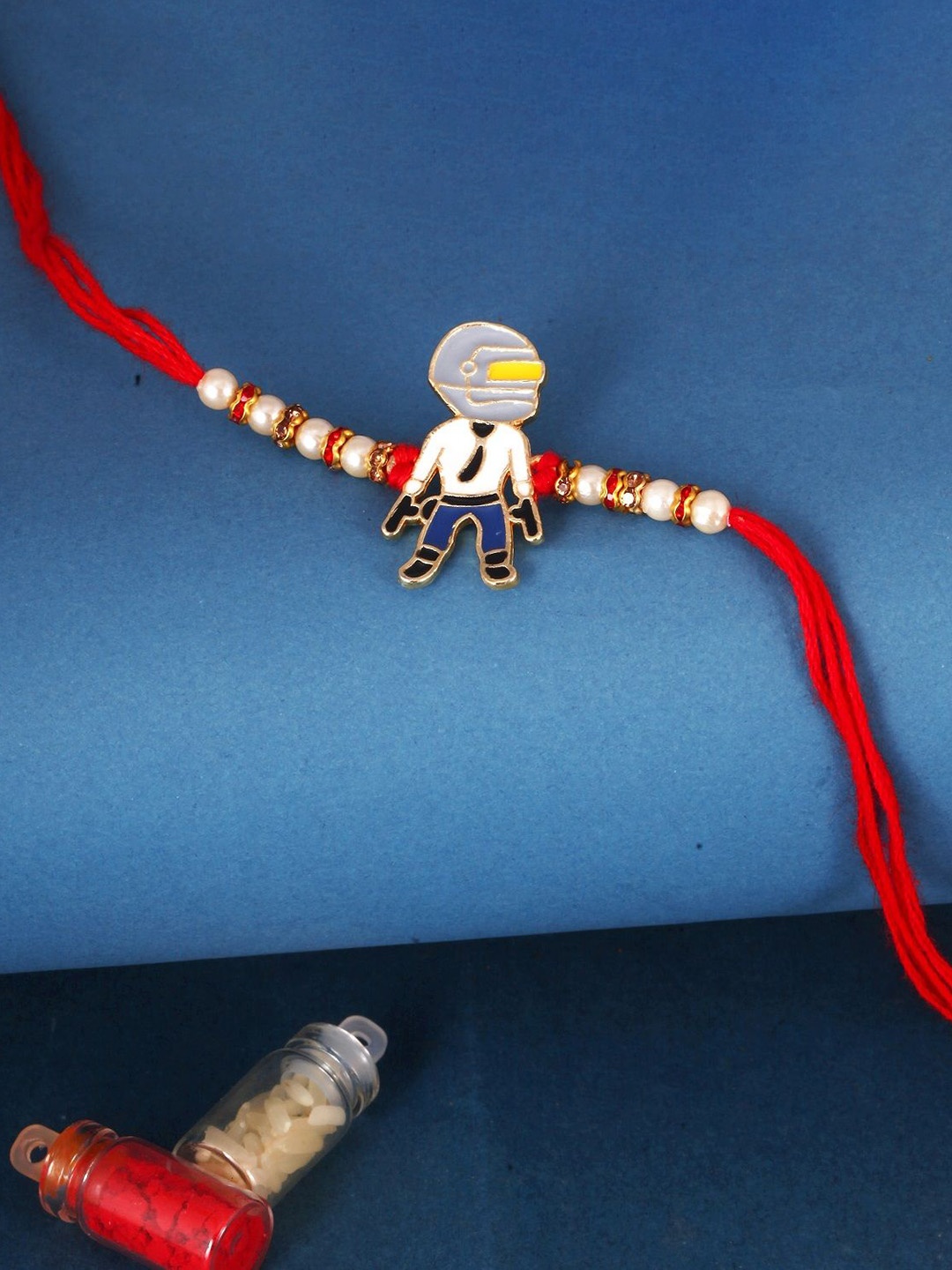 

Vighnaharta Boys Gold And Rhodium Plated Pub G Thread Rakhi, Red