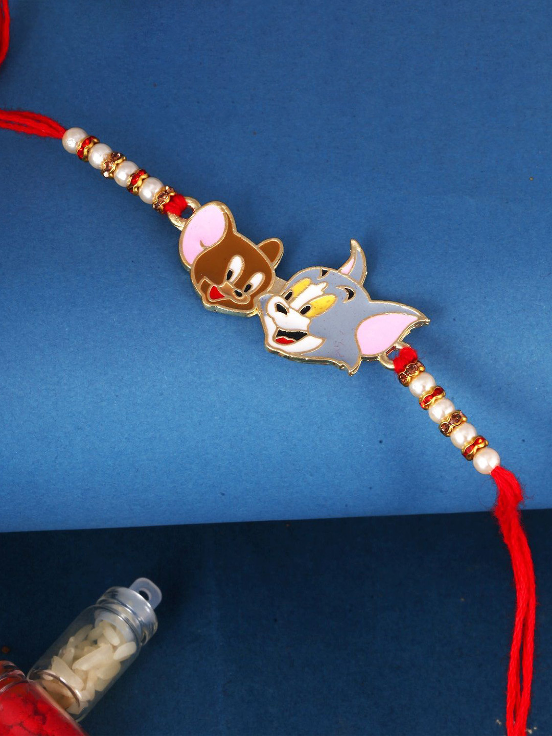 

Vighnaharta Tom and Jerry Cartoon Beaded Thread Rakhi, Gold